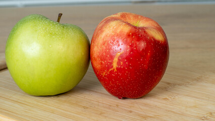 red apple on green background