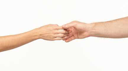 the woman's and man's palms touch each other