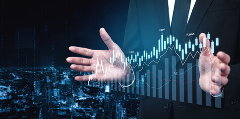 A businessman stands with outstretched hands, presenting financial data represented by graphs. The urban night backdrop highlights analysis and decision-making in finance. Scalp