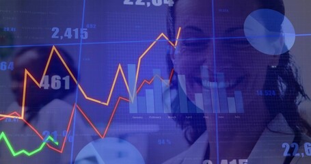Smiling woman in white blazer examining translucent grid in office, with colored lines monthly bars