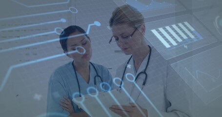 Analyzing medical staff in scrubs and coat discussing patient charts in clinic, digital interface