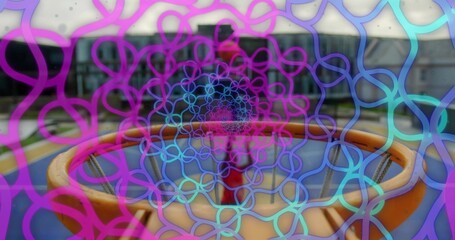 Framing hoop rim with net, man in red dribbling at free-throw line on urban court overlay