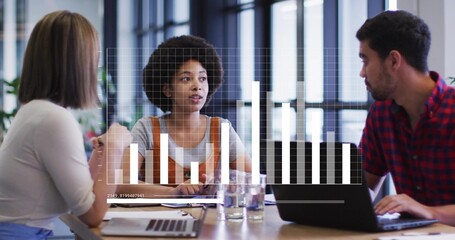 Discussing data woman wearing rust sleeveless top gesturing in meeting room, with chart overlay