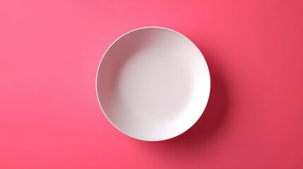 Minimalist White Plate on Vibrant Pink Background for Stylish Decor and Food Presentation, Perfect for Culinary Photography Projects and Creative Designs