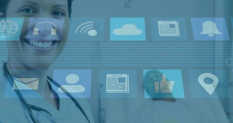 Patient tapping smartphone causing icon overlay while doctor reviewing clipboard monitoring status
