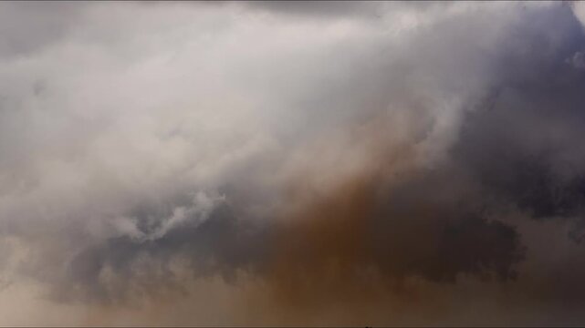 Tornado funnel touching ground during intense severe weather system 