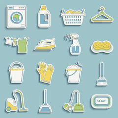 Laundry equipment arranged on blue surface representing household chores and cleaning tasks with a neat and organized presentation.