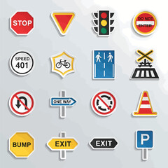 Collection of road signs displayed on a gray surface to communicate rules and regulations for drivers and pedestrians, ensuring safety and order on the roads.