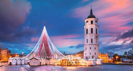 Vilnius, Lithuania. Christmas Tree On Background Bell Tower Belfry Of Vilnius Cathedral At...