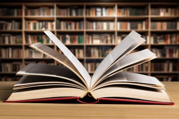Open book pages in library background