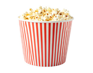 Overflowing popcorn in a red and white striped bucket against a dark background, ready for a movie night