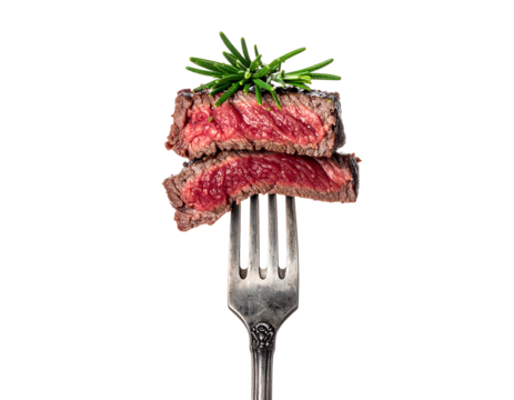 Succulent, medium-rare sliced steak is skewered on a fork, topped with rosemary sprigs against a stark black backdrop