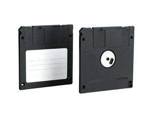 Obraz premium Two black floppy disks, one with a label, face up on black background