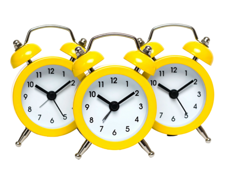 Three bright yellow alarm clocks grouped together, on a black background, showing different times
