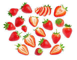 Red strawberries, whole and sliced, are spread across a black background. The berries are ripe and plump