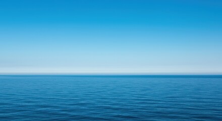 Fototapeta premium Expansive horizontal view of tranquil blue water stretching to the distant horizon under a clear sky, capturing profound serenity and vastness ,reflective ,summer ,sky