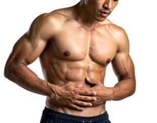 Muscular man holds his stomach, shirtless with prominent abs, on black backdrop, expressing discomfort