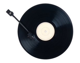 Overhead view of a black vinyl record spinning on a turntable with a white label center against a black background