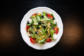 Fresh Garden Salad with Eggs, Olives, and Cheese