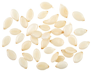 Overhead view of a pile of tiny, pale, oval seeds arranged randomly on a stark black background