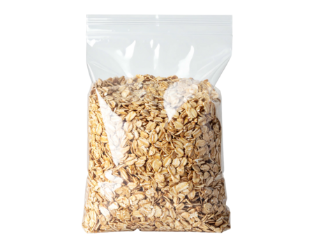 Rolled oats fill a clear, plastic, resealable bag against a white background. Focus sharp on texture and surface