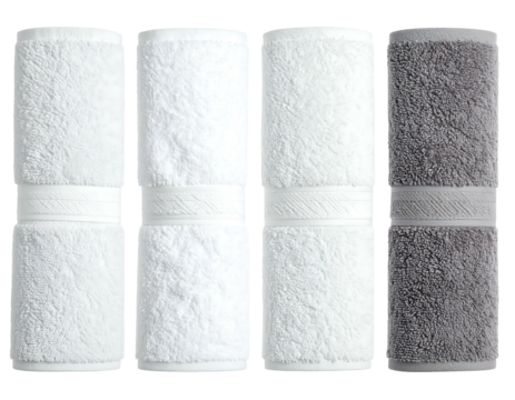 Neatly stacked towels, three white, one gray, all rolled with white decorative stripe, isolated on a black background