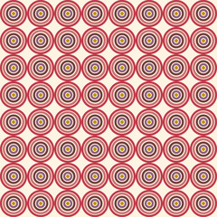 A geometric smooth (seamless) pattern with concentric circles of red, purple and yellow on a cream background