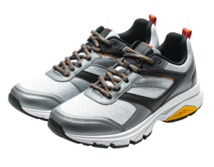 Pair athletic sneakers white mesh, gray panels, black accents, orange laces, white sole, dynamic composition