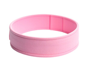 Pink athletic headband on black. Close-up view shows a simple, soft texture and form