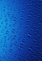 Macro view of vibrant abstract blue surface covered entirely with glistening pure water droplets creating a dynamic wet texture ,window ,vibrant ,condensation