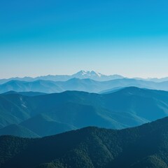 Naklejka premium Majestic blue mountains stretching under a clear, vibrant sky, showcasing a beautiful, expansive summer landscape view ,high ,forest ,slope