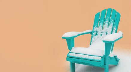 A turquoise adirondack chair covered in snow during winter. Minimalist seasonal contrast concept on a solid background with copy space