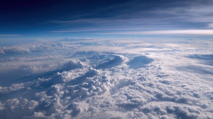 Aerial view of fluffy clouds and blue sky, a beautiful landscape.