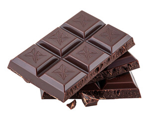 Stacked dark chocolate bar pieces with star patterns on squares, and broken fragments, against a black background