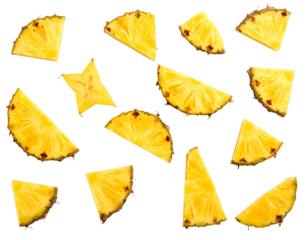 Sliced pineapple pieces and one starfruit section on black, highlighting fruit's texture and vibrant yellow hue