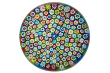 Round Murano glass paperweight displaying intricate colorful flower patterns