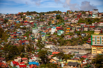 Valley of Colors - colorful Stobosa hillside. Massive artwork made up of a tightly packed cluster of hillside homes painted in bold colors. La Trinidad, Benguet, Baguio, Philiphines