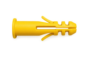 Yellow plastic wall plug anchor for construction and DIY