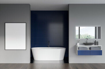 Contemporary bathroom with empty poster on grey wall, minimalist decor, white bathtub, and blue tile accent in clean space layout. 3D Rendering