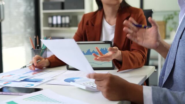 Business team present. professional investor working new start up project. Finance managers meeting.using smart phone and laptop and digital tablet computer in modern office.