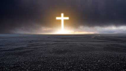 Light of the Christian cross with barren landscape and dark dramatic sky background. Concept of...