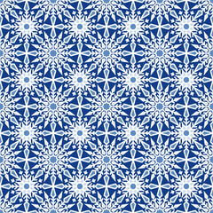Fototapeta premium Seamless blue white geometric tile. Ornamental snowflake vector background. Ceramic Pattern