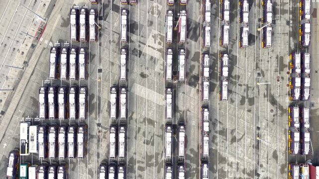 Top down view of Seattle electrical bus transportation terminal with several buses..