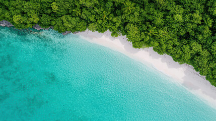 Fototapeta premium Tropical lagoon with turquoise water and white sand beach surrounded by lush greenery