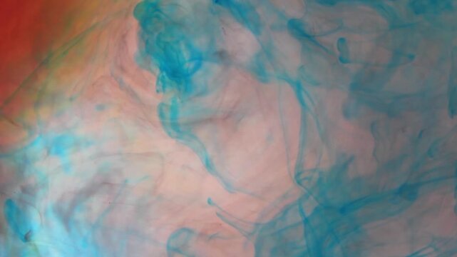 Macro Shot of Turquoise Paint Spreading on a Light Background in Slow Motion