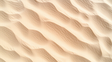 Obraz premium Soft sand dunes create gentle waves and patterns this aerial view, evoking tranquility
