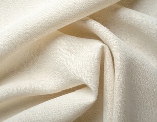 Close-up view of a light-colored, textured fabric with folds and shadows