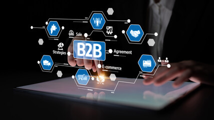 Fototapeta premium Explore the concept of B2B transactions with a digital interface displaying e-commerce strategies and agreements, illustrating modern business interactions. Tessel