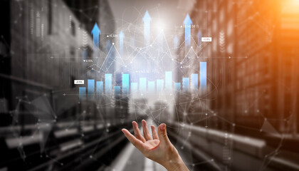 A hand reaching out towards digital financial graphs showcases growth and investment opportunities....