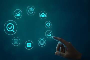 Finger selecting analytics and productivity icons on circular digital interface